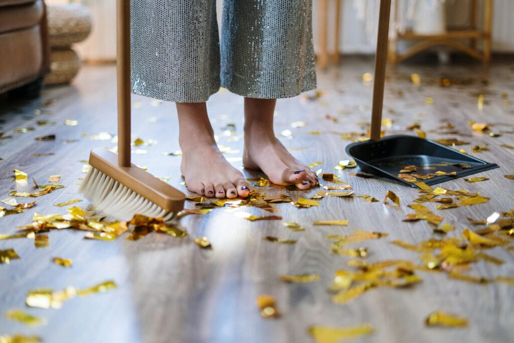 Woman sweeping the house -physical renewal at play